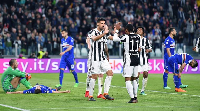 Juventus players celebrate scoring against Sampdoria in Serie A