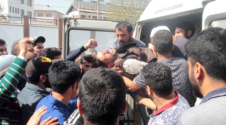 Clashes between the locals and police broke out after news of the killing of the militants spread in south Kashmir. Several people were injured and rushed to the hospital for treatment. (Express photo/Shuaib Masoodi)