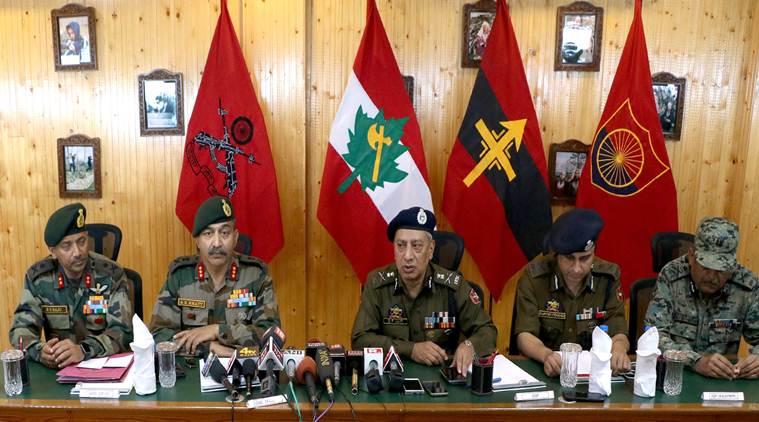 Anil Kumar BhaTt addresses the media along with SP Vaid at the Victor Force Headquarters in Awantipora on Sunday. (Express photo/Shuaib Masoodi)
