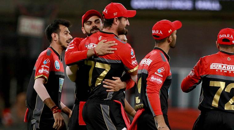 Royal Challengers Bangalore players celebrating a wicket (Photo Source - IANS)