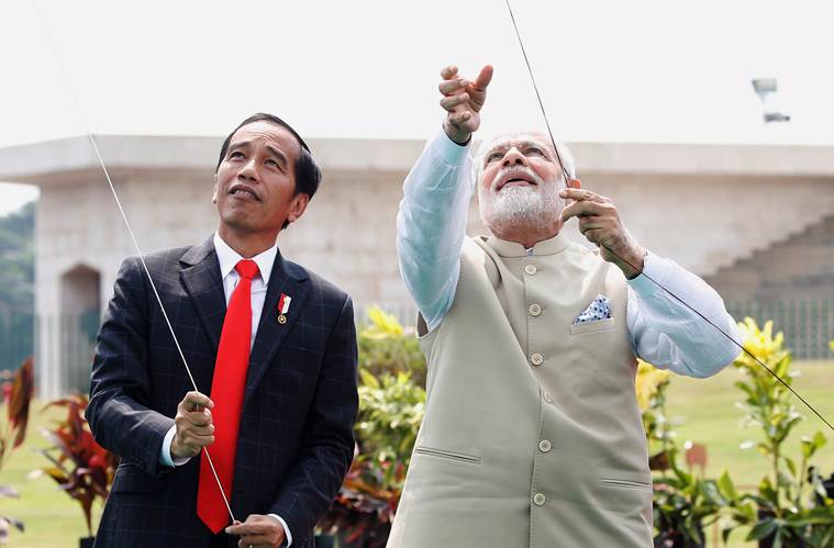 Narendra Modi, Narendra Modi Indonesia, Narendra Modi flying kites, Indonesian president, Joko Widodo, Modi in Indonesia, Indonesia Kite exhibition, India news