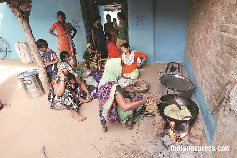 dinner at dalit house, bjp mp, yodi adityanath, uttar pradesh, madhya pradesh, sc st, spending night at dalits house, indian express