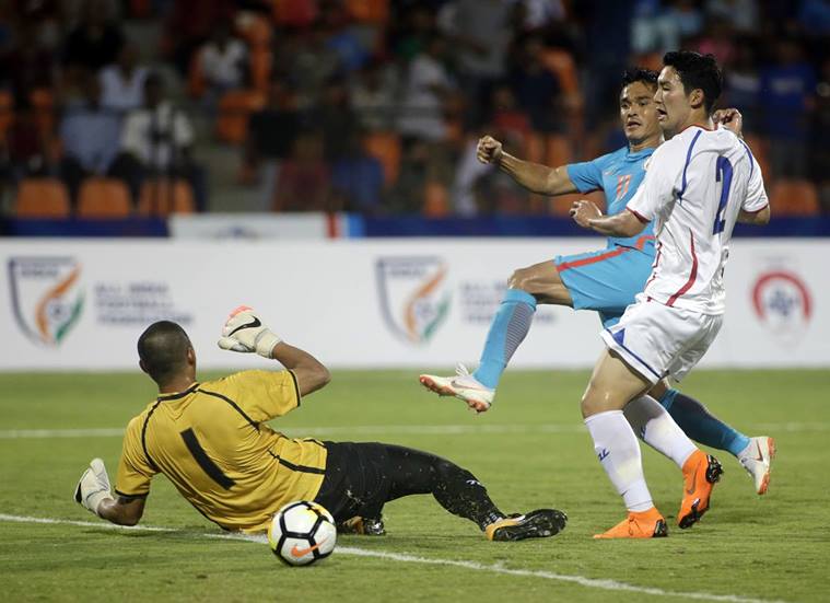 Sunil Chhetri, center strike a goal against Taiwan during the Hero Intercontinental Cup soccer match in Mumbai, India