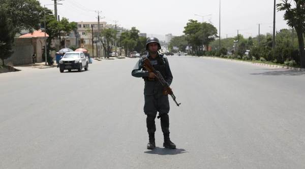 A member of security personnel stands at the site of a deadly suicide attack in Kabul, Afghanistan, Monday, June 4, 2018. A suicide bombing targeted a gathering of Afghanistan's top clerics on Monday in Kabul, killing at least seven people and wounding nine. (AP Photo/Rahmat Gul) The Afghan Taliban on Saturday announced a three-day ceasefire over the Eid holiday at the end of this week, their first offer of its kind, following a ceasefire announced by the government on Thursday. The militants said foreign forces would be excluded from the ceasefire and that operations against them would continue. They also said they would defend themselves against any attack. "In three days, maybe the unity of Taliban insurgents will be put to test," a European diplomat told Reuters. "If different factions don’t accept the ceasefire, then attacks will continue." Afghan President Ashraf Ghani announced an unconditional ceasefire with the Taliban on Thursday, until June 20, coinciding with the end of the Muslim fasting month of Ramadan, but excluding other militant groups, such as Islamic State. Ghani's decision came after a meeting of Islamic clerics declared a fatwa, or ruling, against suicide bombings, one of which, claimed by Islamic State, killed 14 people at the entrance to the clerics' peace tent in Kabul. The clerics also recommended a ceasefire with the Taliban, who are seeking to reimpose strict Islamic law after their ouster in 2001, and Ghani endorsed the recommendation, saying it would last until June 20. It was not immediately clear when the Taliban ceasefire would begin, as Eid starts when the moon is first sighted on either the 29th or 30th day of Ramadan, and the moon appears at different times across the country. Ghani has urged ceasefires with the Taliban before, but this was the first unconditional offer since he was elected in 2014. In August, U.S. President Donald Trump unveiled a more hawkish military approach to Afghanistan, including a surge in air strikes, aimed at forcing the Taliban to the negotiating table. Afghan security forces say the impact has been significant, but the Taliban roam huge swaths of the country and, with foreign troop levels of about 15,600, down from 140,000 in 2014, there appears little hope of outright victory. The Taliban's surprise announcement comes as Trump and North Korean leader Kim Jong Un are due to sit down to a summit in Singapore on Tuesday, something few people would have predicted just months ago when threats between the two sides were at their most bellicose.