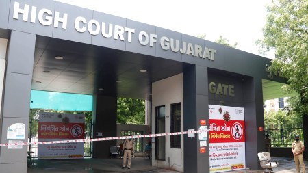 Gujarat High Court upholds constitutional validity of Land Grabbing Act, including provisions applied retrospectively