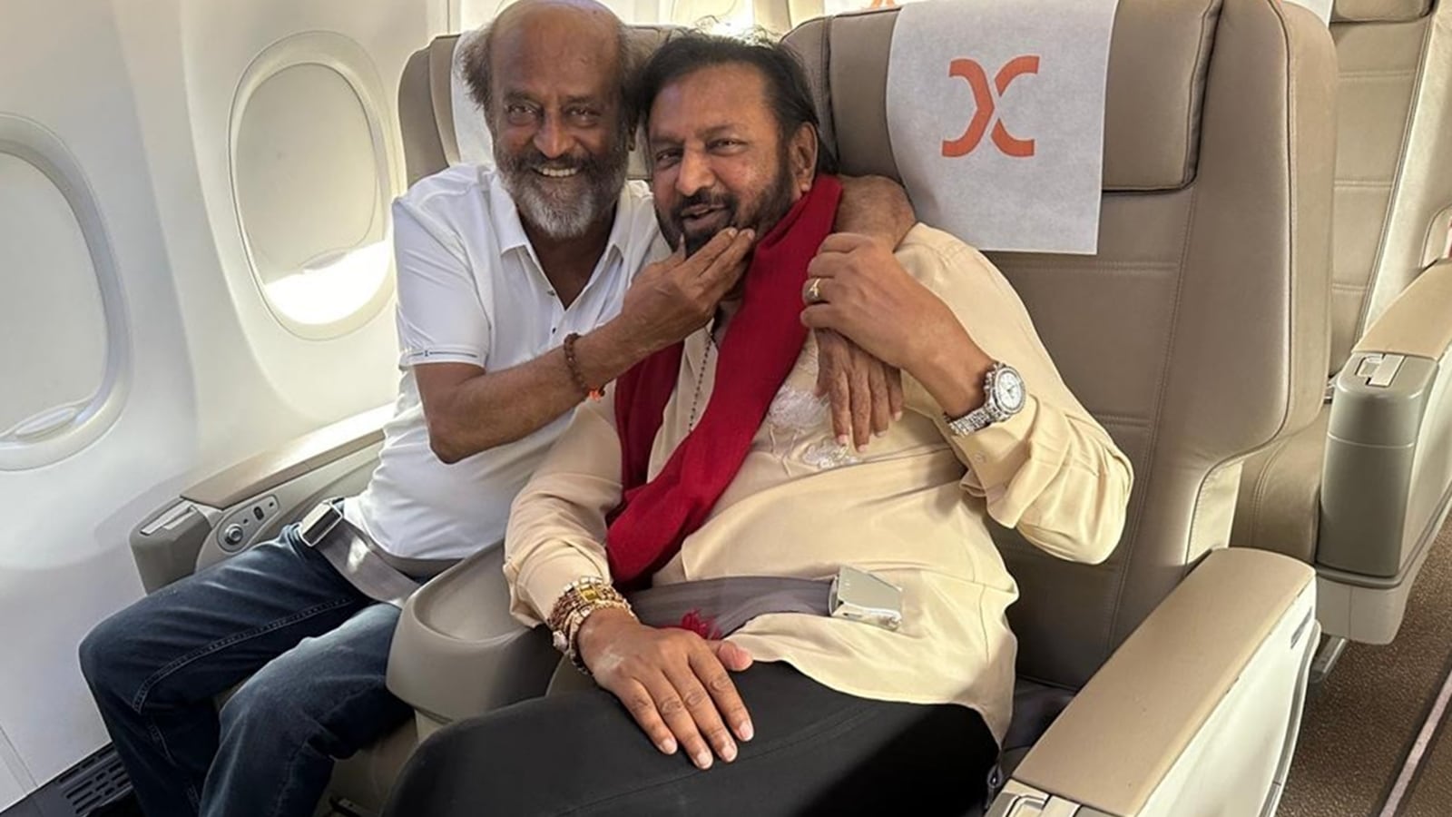 Rajinikanth Mohan Babu Share Adorable Moment On Hyderabad Bound Flight