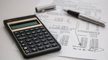 calculator pen and tax calculation on printed documents union budget 2025