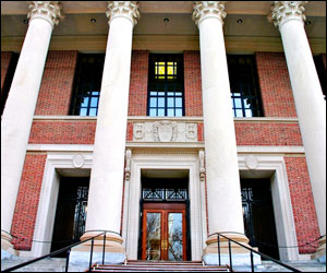 In a letter posted on Harvard's website, President Lawrence Bacow said the school's endowment had no direct investments in fossil fuel exploration or development companies as of June and will not make such investments in the future, "given the need to decarbonize the economy." (File)