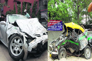 Woman killed as sports car smashes into taxi