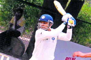 Sehwag back from injury,with a bang