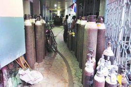 M_Id_254040_Oxygen_cylinders_in_the_basement_of_main_AMRI_Hospital no alt set