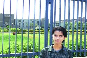 Moved by poor boy fighting for a seat in GNLU,ex-judge gives him a roof