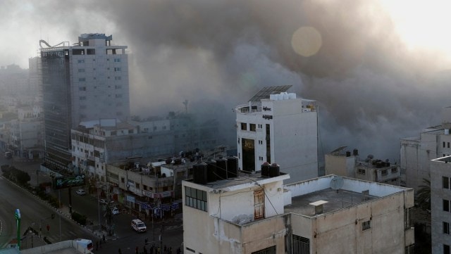 Smoke rises following Israeli airstrikes on a building in Gaza City, Wednesday, May 12, 2021. (AP Photo/Adel Hana)