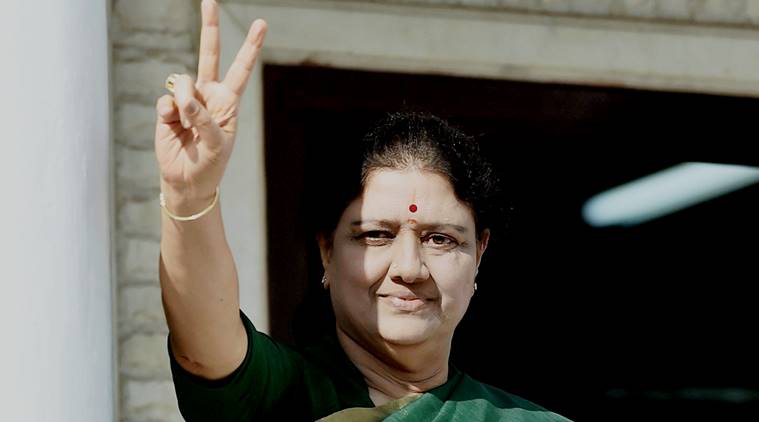 Chennai: AIADMK General Secretary V K Sasikala flashes a victory sign after attending the party MLA's meeting in which she was elected as a AIADMK Legislative party leader, set to become Tamil Nadu CM, at Party's Headquarters in Chennai on Sunday. PTI Photo by R Senthil Kumar (PTI2_5_2017_000121a)