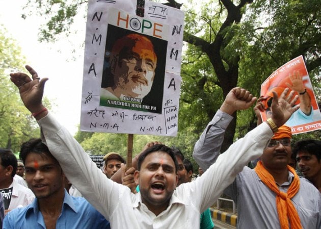 Today in pics: Narendra Modi’s supporters protest outside LK Advani’s ...