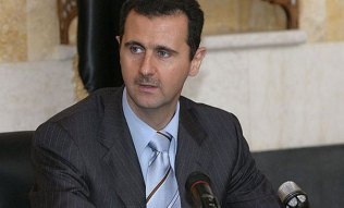 China’s top paper says United States wants regime change in Syria