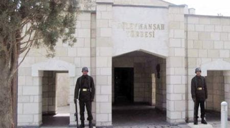 Turkish soldiers stand guard at the entrance of the memorial site of Suleyman Shah, grandfather of Osman I, founder of the Ottoman Empire, in Karakozak village, northeast of Aleppo, Syria. (Source: AP photo)