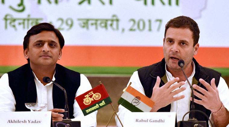 Lucknow: Congress Vice President Rahul Gandhi speaks as Uttar Pradesh Chief Minister and Samajwadi Party President Akhilesh Yadav looks on during a joint press conference in Lucknow on Sunday. PTI Photo by Nand Kumar (PTI1_29_2017_000098B)