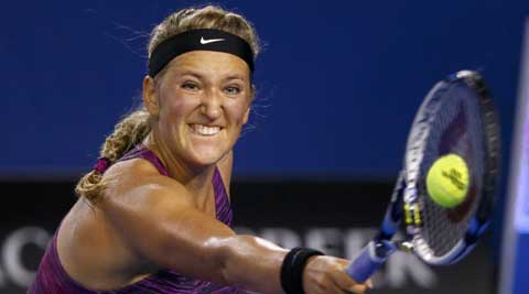 Victoria Azarenka of Belarus hits a return to Barbora Zahlavova Strycova of the Czech Republic during their women's singles match at the Australian Open 2014 (Reuters)