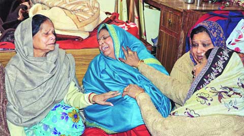 Deepanshu Sudhir’s mother (centre) grieves her son’s death at their Sector 27 residence on Friday. (Inset) Deepanshu. Kshitij Mohan
