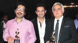 Sameer Gautam Singh, Apurva M. Asrani and Hansal Mehta pose with their Screen award for Best Screenplay
