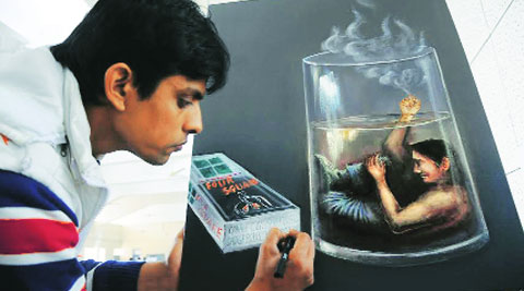 An painter at the youth artist camp at PAU Tuesday.