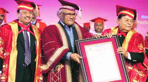 Forest & Rehabilitation Minister Patangrao Kadam  presents Doctor of Science to C N R Rao during the 15th convocation ceremony of Bharati Vidyapeeth University on Wednesday.