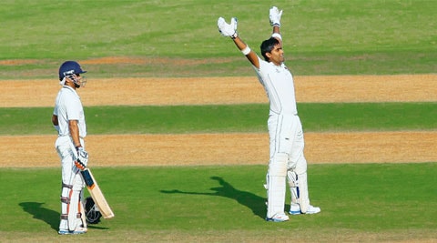 Mumbai's Suryakumar Yadav celebrates after scoring a century against Maharashtra on Day One at the Wankhede Stadium (IE Photo Kevin D'Souza)