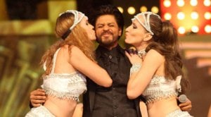 Host of the show Shah Rukh Khan flashes his dimples