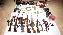 Police recovered two AK-47, two SLR, one carbine, one .303, one 12-bore gun, a pistol and a walkie-talkie from the spot, along with a lot of other material.