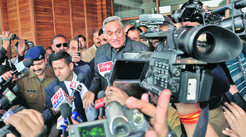 Vijay Bahuguna after submitting his resignation to Governor Aziz Qureshi, in Dehradun Friday. PTI