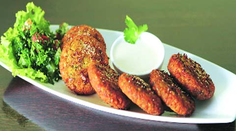 Crisp falafels with greens.