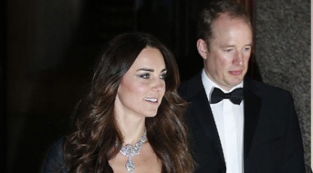 The Duchess of Cambridge was wearing a dark Jenny Packham dress yesterday, but it was the Cartier diamond known as the Nizam of Hyderabad, given to Queen Elizabeth II in 1947 for her wedding to the Duke of Edinburgh, that had tongues wagging. (AP) 