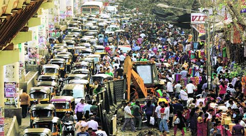 A scene just outside Borivali railway station. Such chaos is a common sight in areas outside city’s railway stations, where air pollution and decibel levels are often unbearable. (Express)