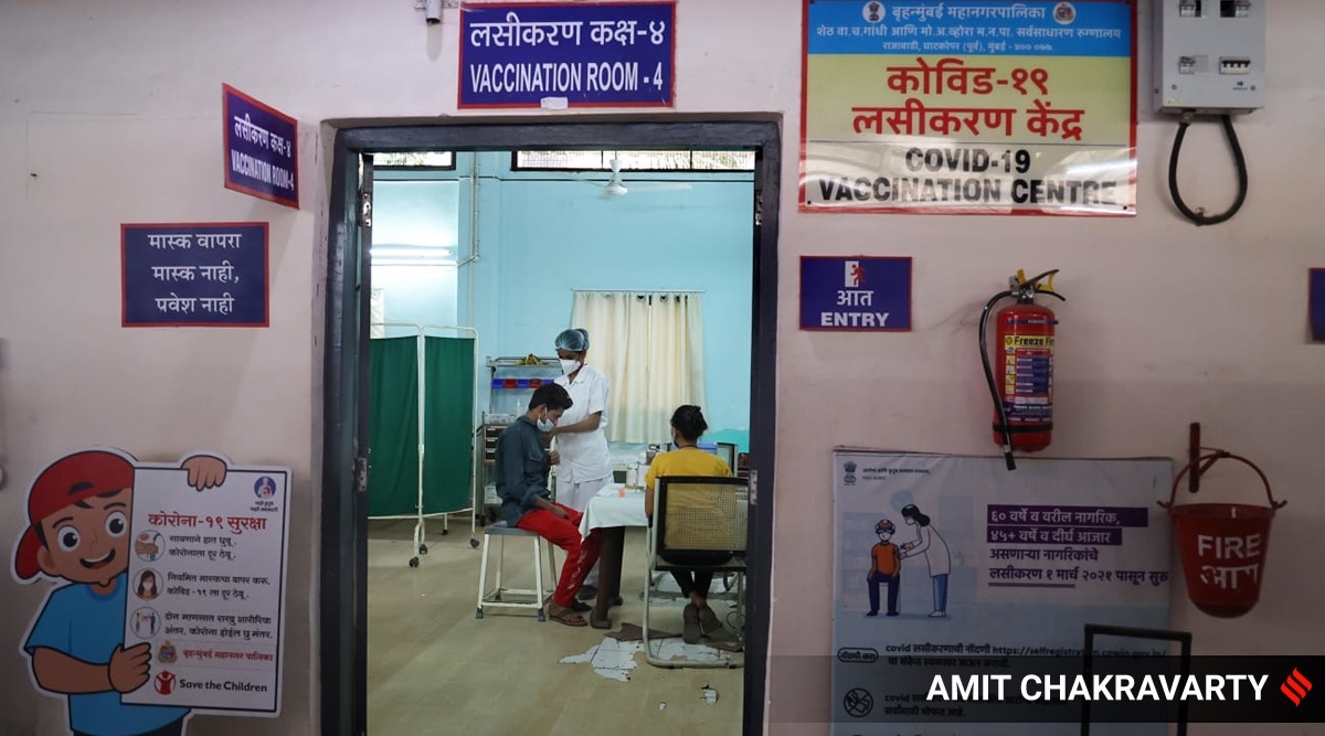 A beneficiary receives a shot of a Covid-19 vaccine in Mumbai. (Express Photo: Amit Chakravarty)