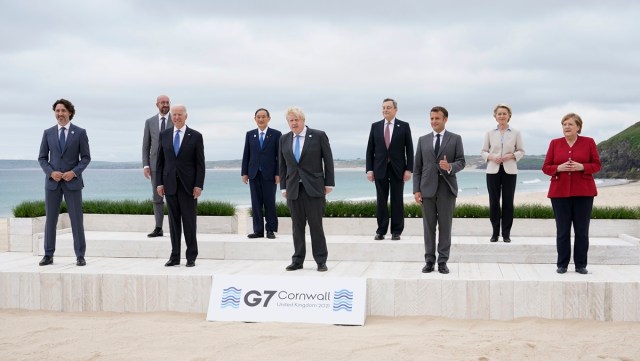 Leaders of the G7 pose for a group photo on overlooking the beach at the Carbis Bay Hotel in Carbis Bay, St. Ives, Cornwall, England, Friday, June 11, 2021. Leaders from left, Canadian Prime Minister Justin Trudeau, European Council President Charles Michel, U.S. President Joe Biden, Japan's Prime Minister Yoshihide Suga, British Prime Minister Boris Johnson, Italy's Prime Minister Mario Draghi, French President Emmanuel Macron, European Commission President Ursula von der Leyen and German Chancellor Angela Merkel. (AP Photo/Patrick Semansky, Pool)