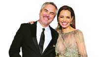Alfonso Cuaron and Angelina Jolie at the Oscars