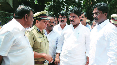 BJP leaders inquire about the case from police personnel in Bangalore on Wednesday.www.pics4news.com