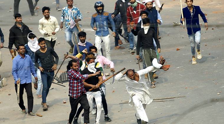 Right under Delhi Police nose, men with rods, sticks assault, set homes ablaze, check ID cards, smash CCTVs