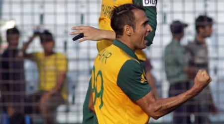 Birthday boy Imran Tahir's clinical spell of 4/21 landed him a well-deserved man of the match award. (AP) 