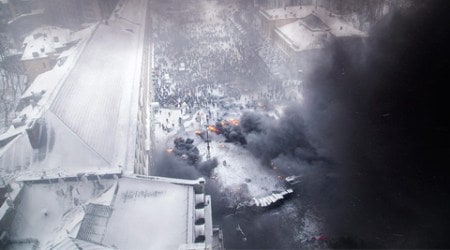 An aerial view shows pro-European protesters burning tyres during clashes with riot police. (Reuters)