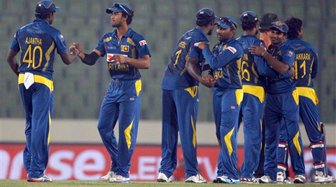 Sri Lankan players celebrate their win over Afghanistan during the Asia Cup one-day international cricket match in Dhaka, Bangladesh, Monday, March 3, 2014. Sri Lanka won the match by 129 runs. AP Photo