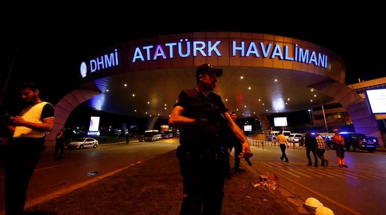 A riot police officer stands guard at the entrance of the Ataturk airport in Istanbul, Turkey, following a multiple suicide bombing, early June 29, 2016. REUTERS/Murad Sezer