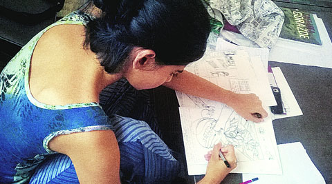 Sunandita Mehrotra with her illustrations.