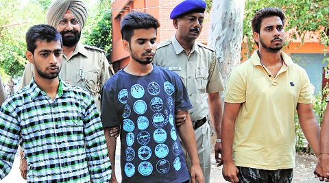 The three accused in police custody. (Express)