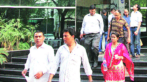 Flat owners after their meeting with Supertech CMD  R K Arora in Noida Sector -58 on Saturday.Gajendra yadav