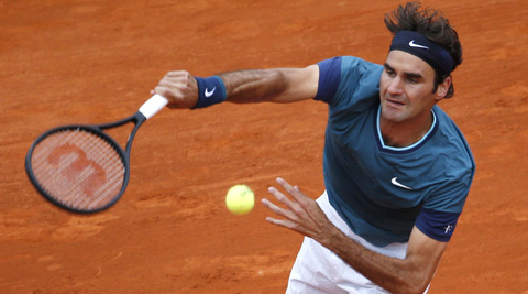 Roger Federer defeated veteran Radek Stepanek 6-1, 6-2 in 52 minutes to advance into the third round of the Monte Carlo Masters. (Reuters)