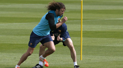 Barca's captain Carles Puyol, who has been injured for a majority of the season, has been included in the squad to face Madrid in the King's Cup final in Valencia. (Reuters)