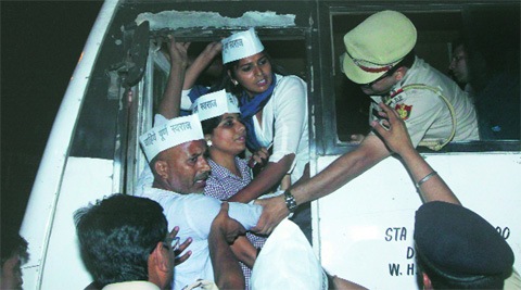 AAP members protesting outside Tihar jail being taken away by police on Wednesday night. ( Source: Express photo by Prem Nath Pandey )