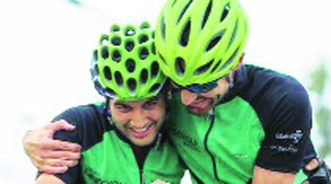 Nachiket Joshi and Michael Lehnig celebrate their victory at the finish line of the Criterium in Bangalore.